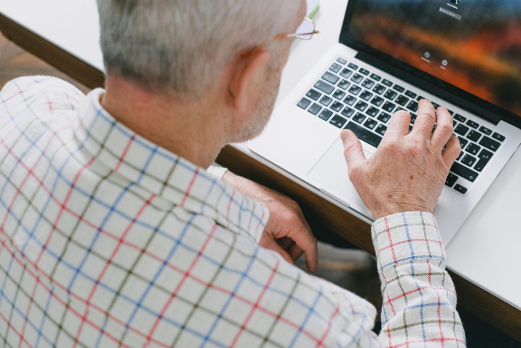 Man Using Macbook Pro